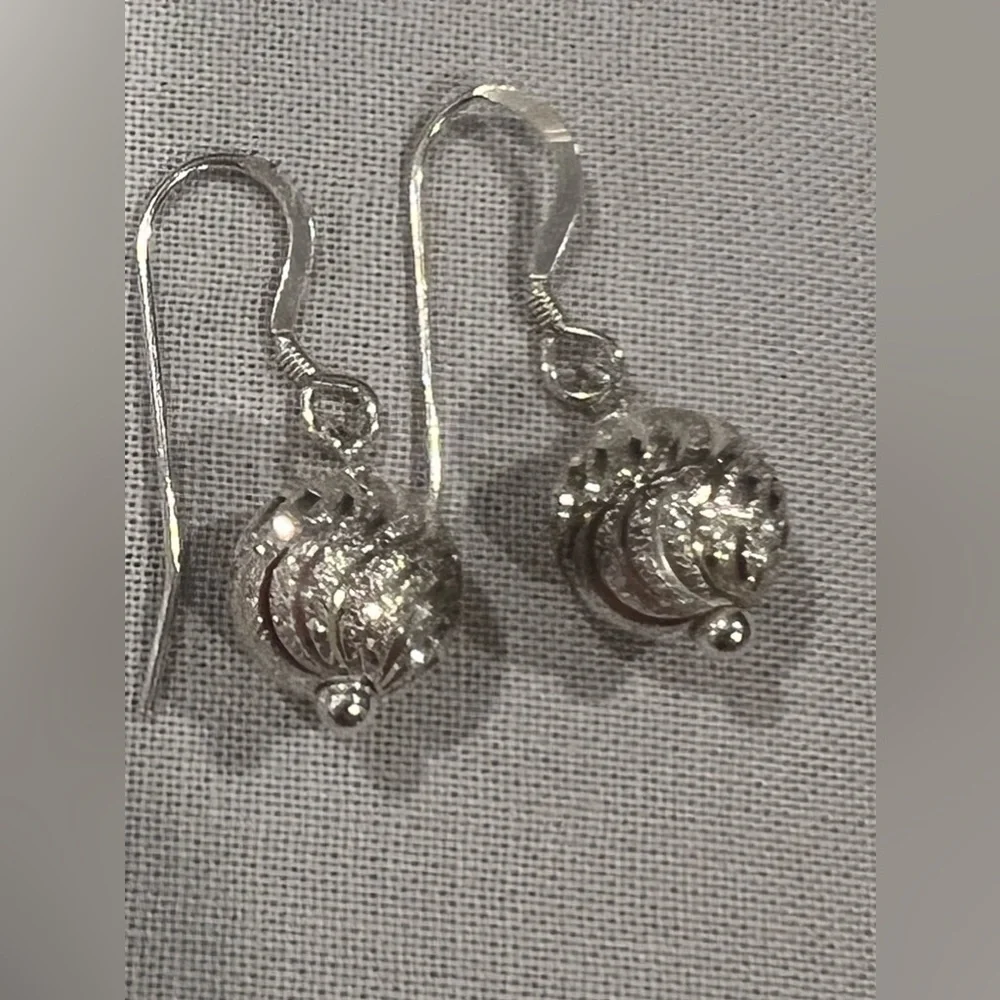 Two pair of silver earrings